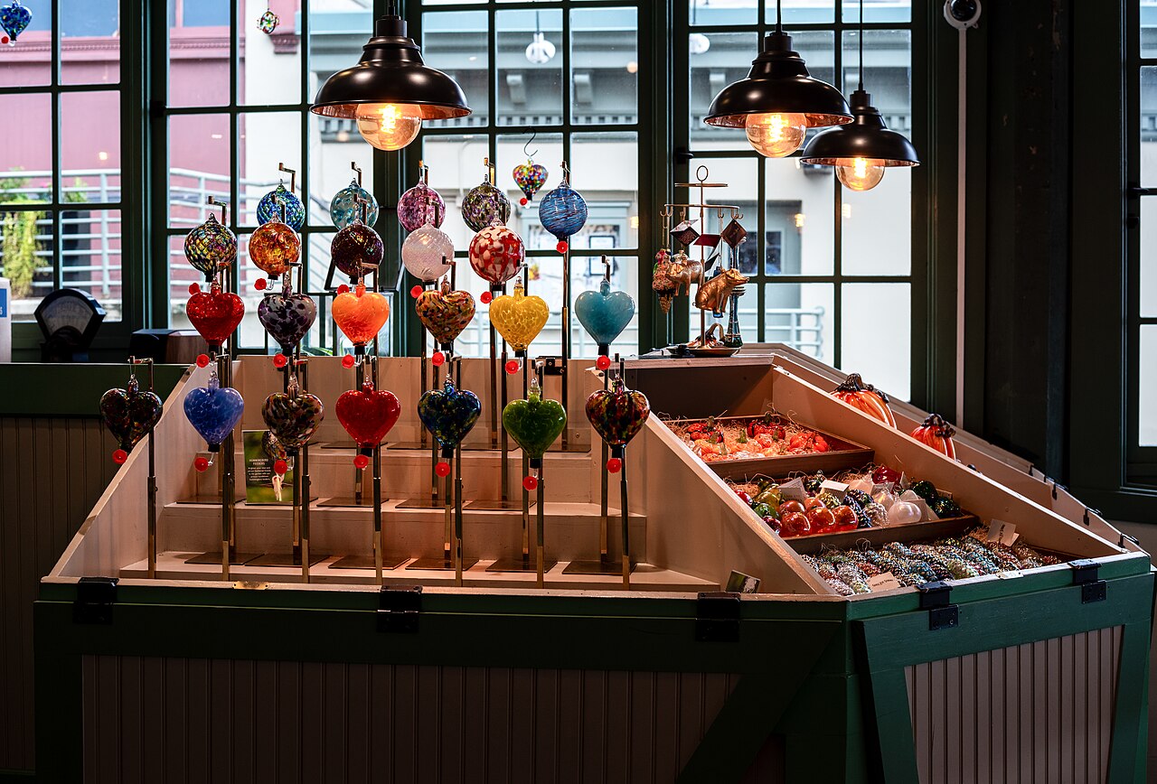 A market stall with hand-blown glass hearts and ornaments